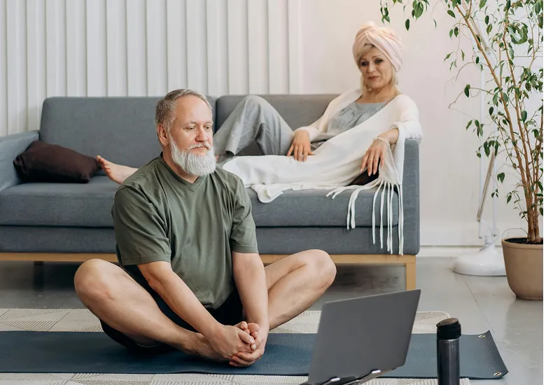 A man practices yoga
