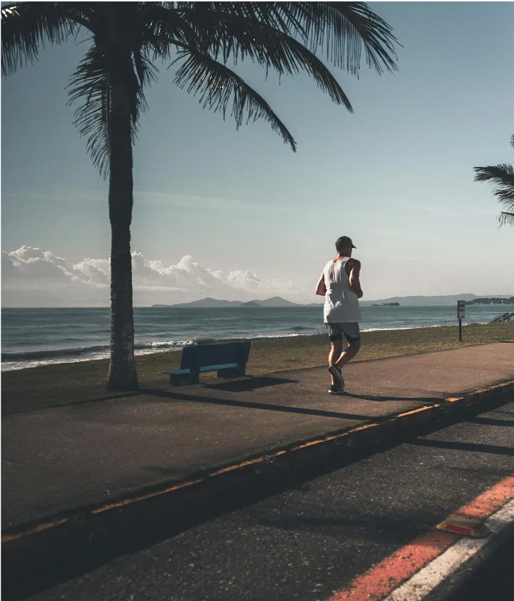 jogger in a white tank top
