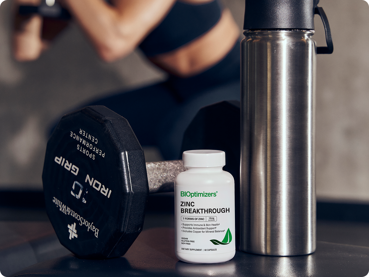 Zinc Breakthrough bottle with dumbbell and water bottle